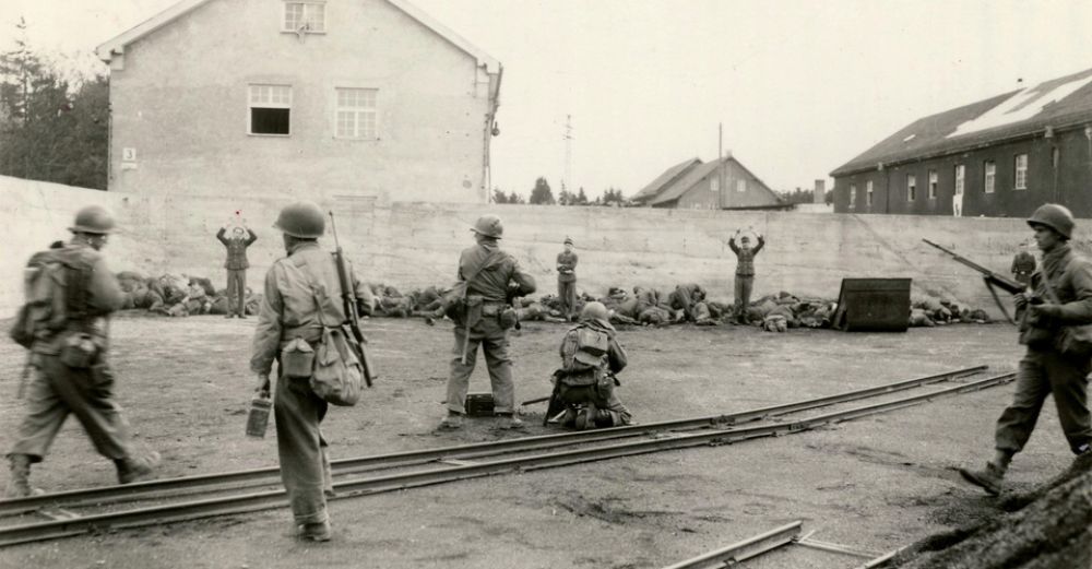 wide_Dachau_execution_coalyard_1945-04-29.jpg