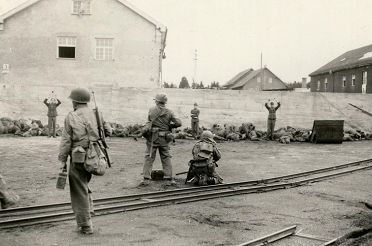 wide_Dachau_execution_coalyard_1945-04-29.jpg